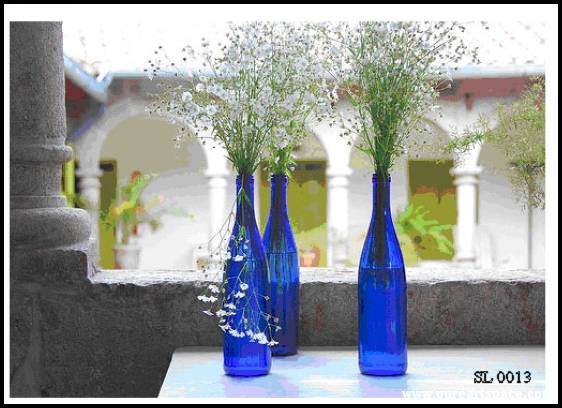 Blue bottles by the window